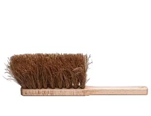 A heavy-duty cleaning brush with dense brown bristles and a light-colored wooden handle, isolated on a white background.
